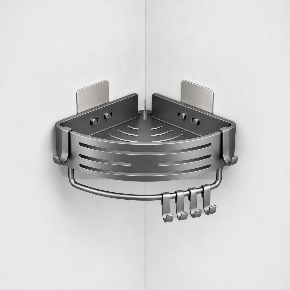 Gray aluminum corner shower basket with a slotted curved front, a towel bar and four hooks underneath, hung in a light grey corner with the tops of its two wall plates just showing behind it