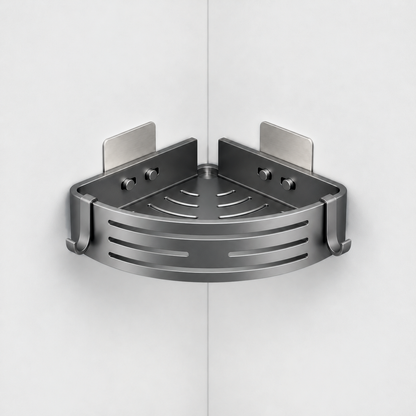 Gray aluminum corner shower basket with a slotted curved front and a hook at each end, no towel bar, hung in a light grey corner