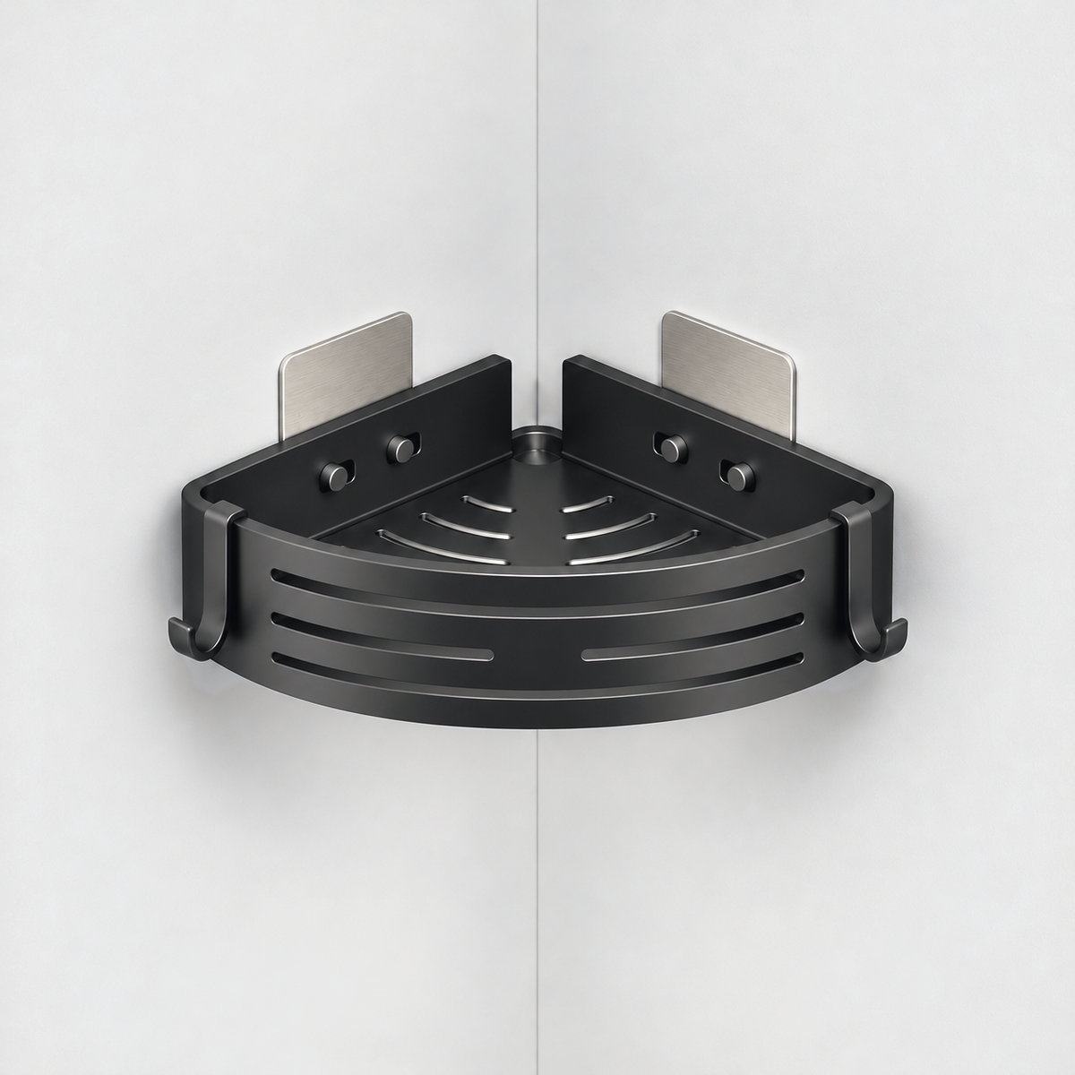 Matte black aluminum corner shower basket with a slotted curved front and a hook at each end, no towel bar, hung in a light grey corner