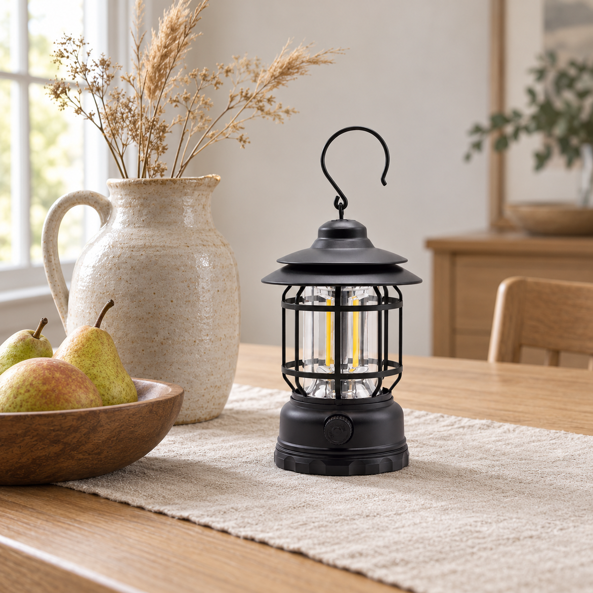 Black vintage lantern switched off on an oak dining table in daylight