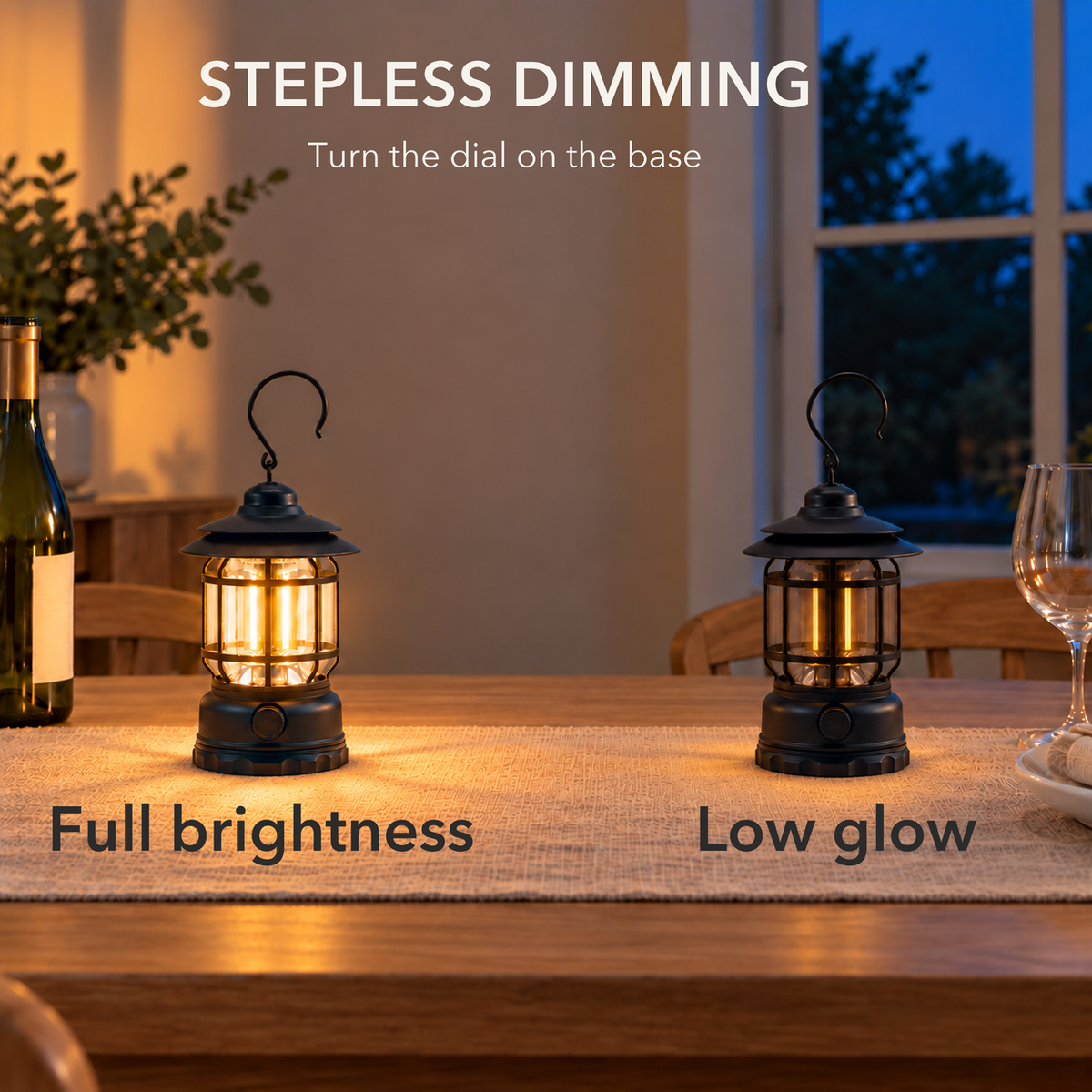 Two black lanterns on one dinner table, one at full brightness and one turned down to a low glow