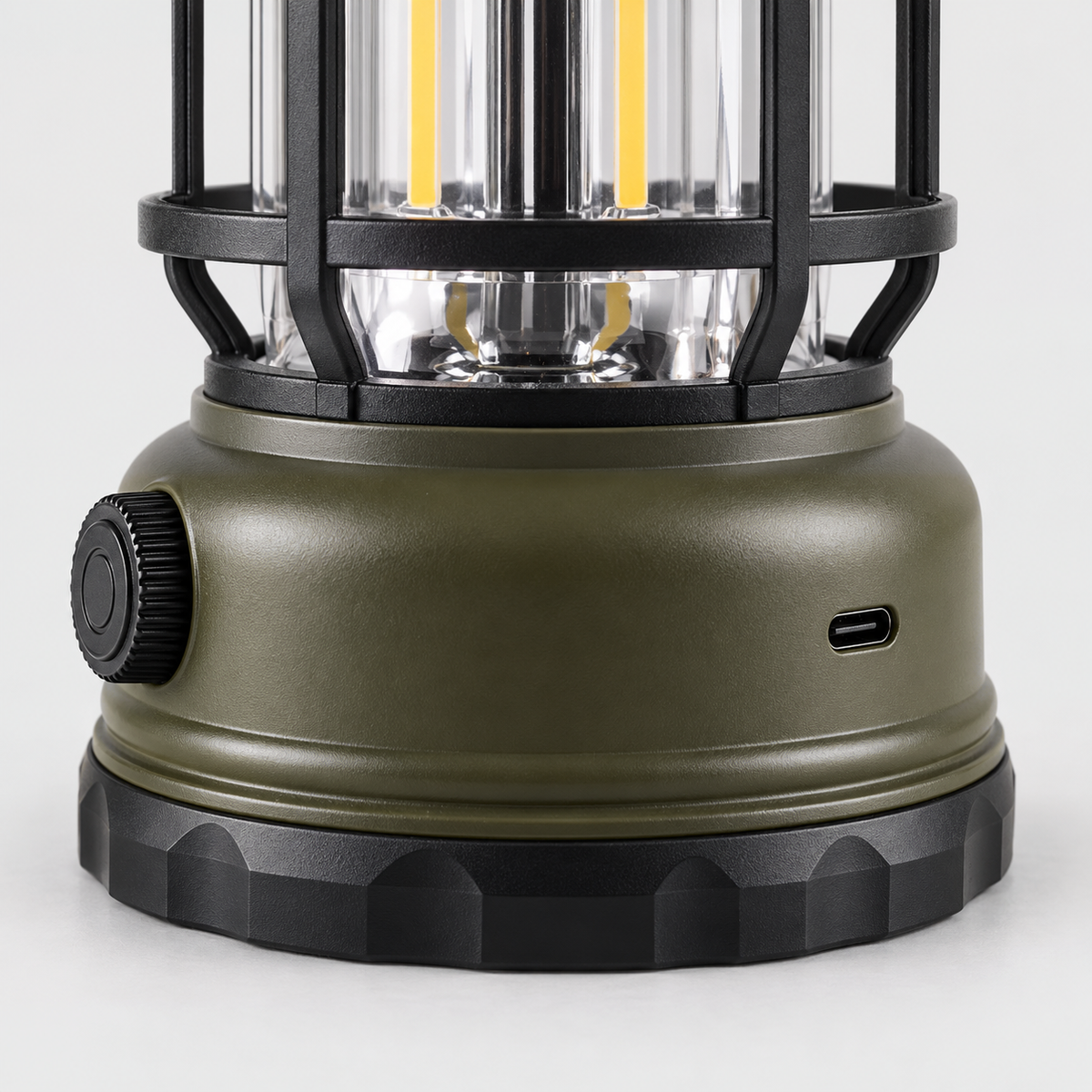 Close-up of the lantern base with its dimmer dial, USB-C charging port and ridged foot ring