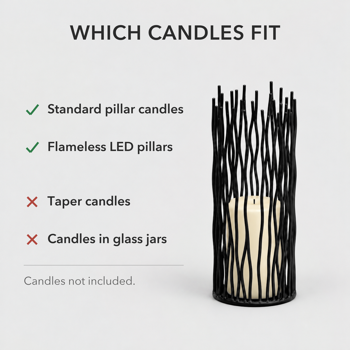 Medium black iron candle holder with a pillar candle inside, showing which candles fit