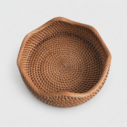 Looking down into the empty rattan basket at its woven floor spiraling out from the center