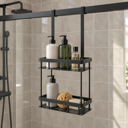 Two-tier black shower caddy hanging high on a black framed glass shower door in a soft gray tiled bathroom