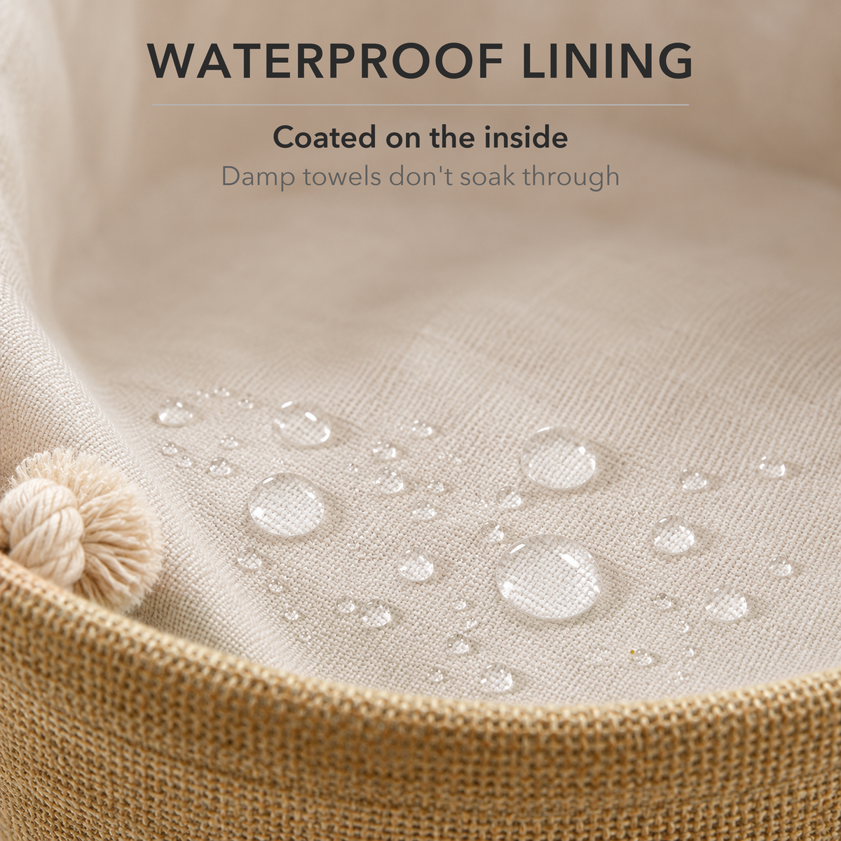 Close-up of the pale waterproof lining inside the laundry basket with water beading on it, and the text Waterproof lining