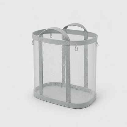 Gray mesh laundry basket with two carry handles, one on each side, on a plain gray background