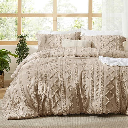 Khaki tufted duvet cover set with matching pillow shams on a bed