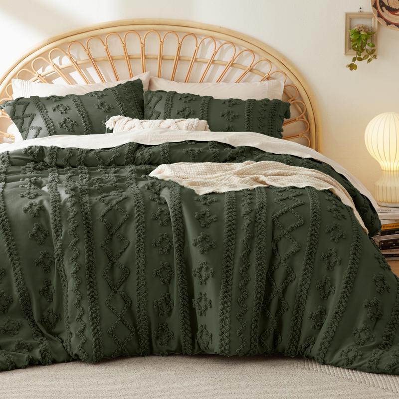 Olive green tufted duvet cover set on a bed with a rattan headboard