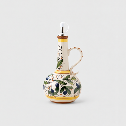 Ceramic oil and vinegar bottle with olive branch design, loop handle and pour spout on a light grey background