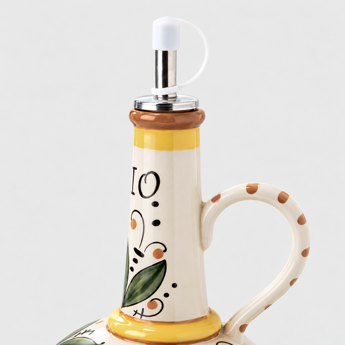 Close-up of the pour spout with its white tethered cap and the Olio lettering on the neck