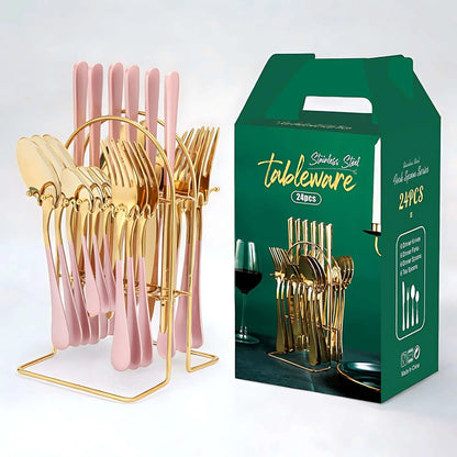 Cutlery set with pale pink handles and gold heads hanging on a gold arched storage rack