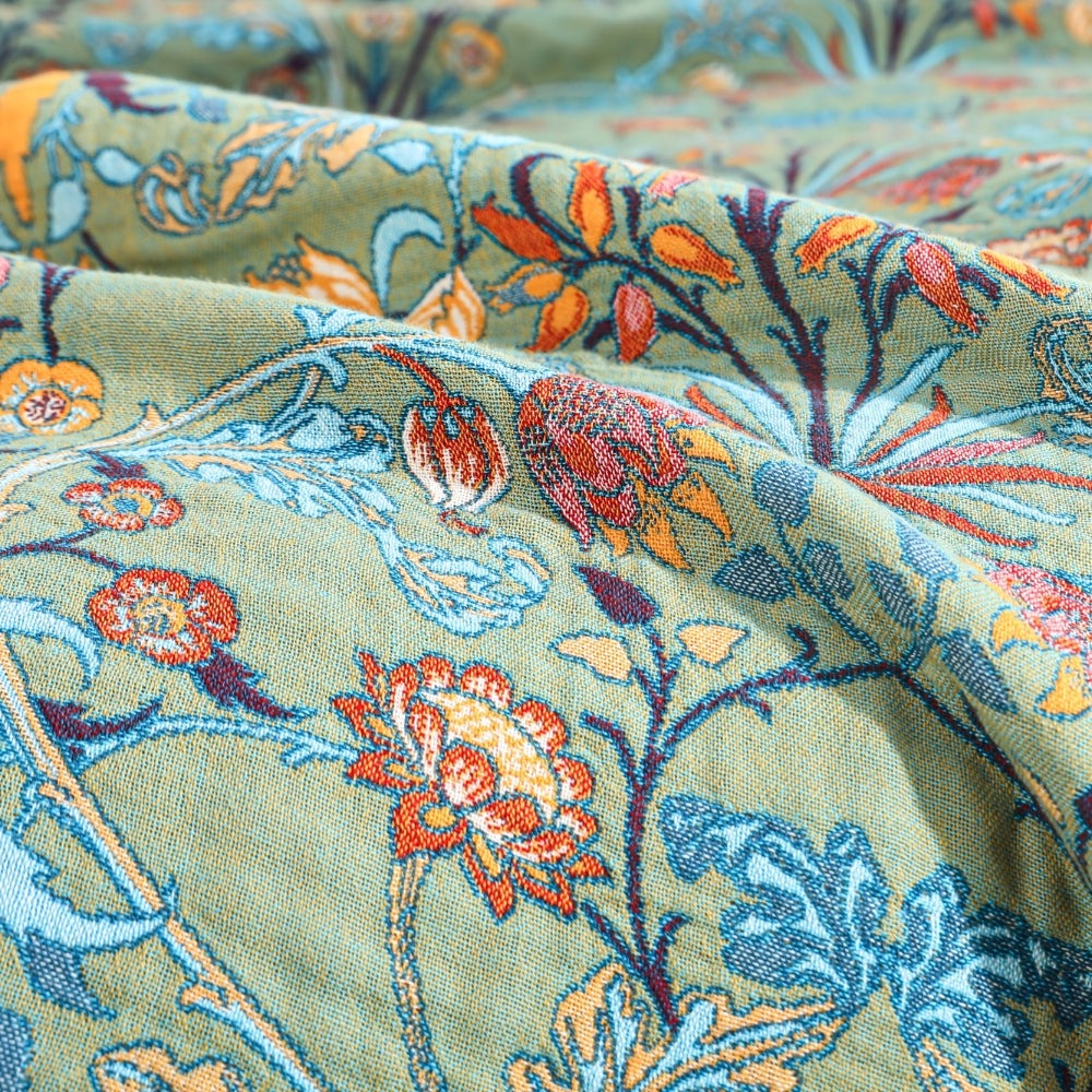 Close-up of the jacquard woven flowers and leaves on the green side