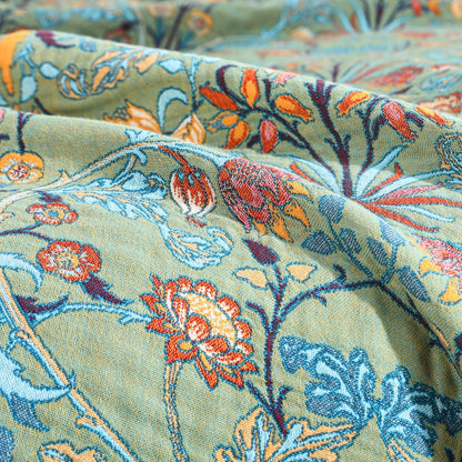 Close-up of the jacquard woven flowers and leaves on the green side