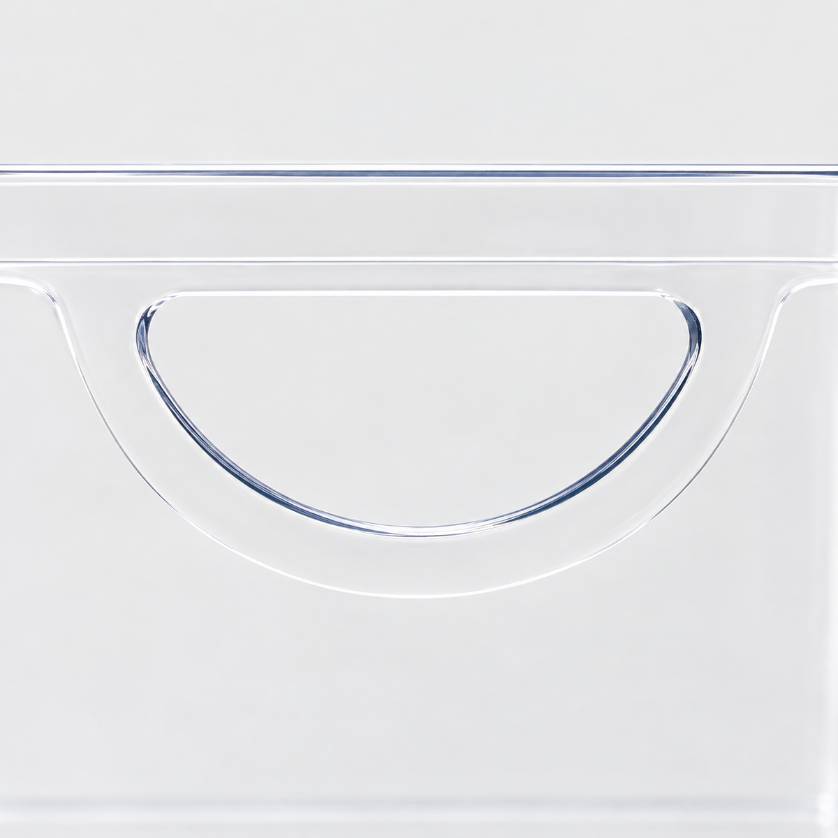 Close-up of the half-moon handle cut-out in the side wall of the clear pantry bin