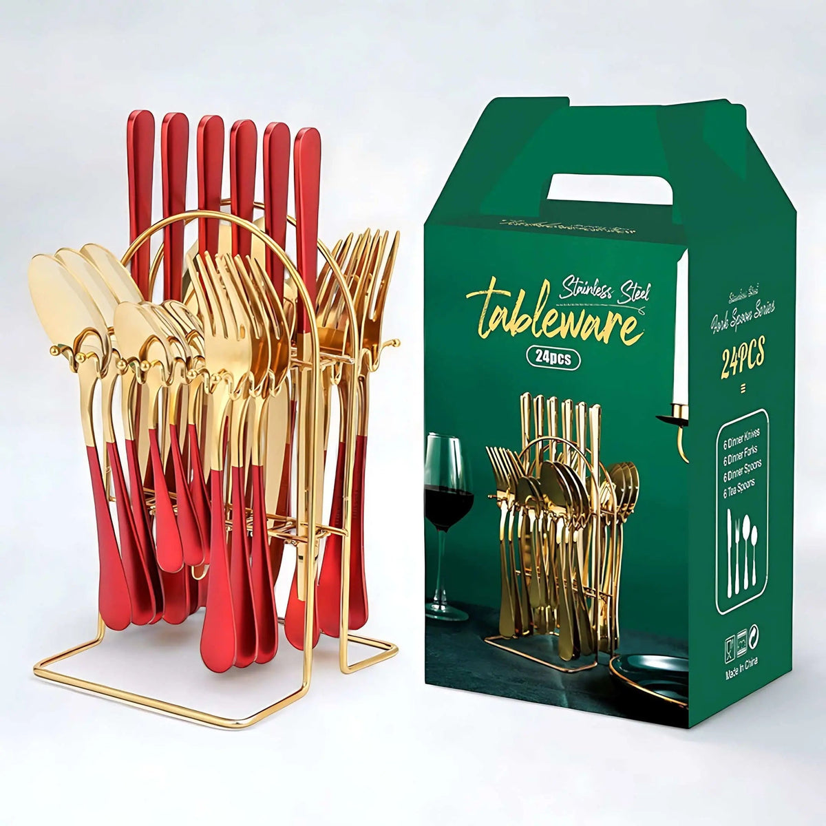 Cutlery set with red handles and gold heads hanging on a gold arched storage rack