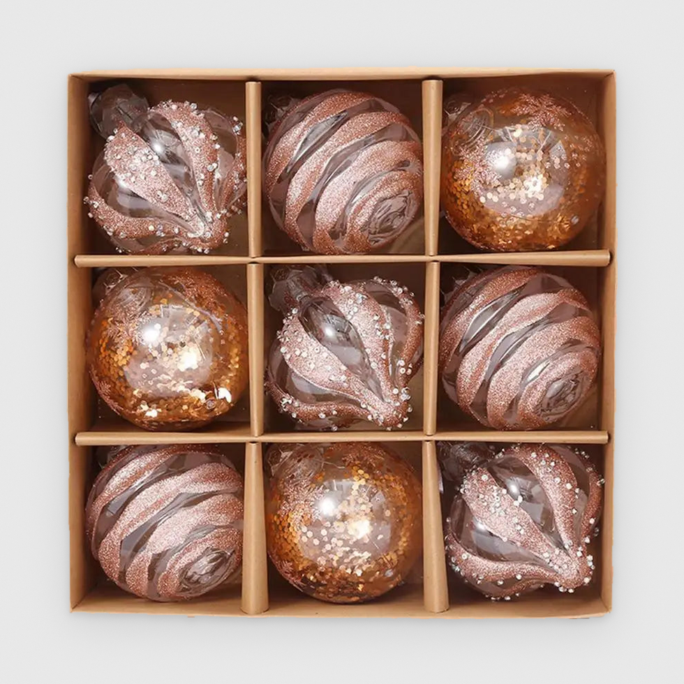 Box of 9 clear Christmas baubles with rose gold glitter and copper sequins in three designs