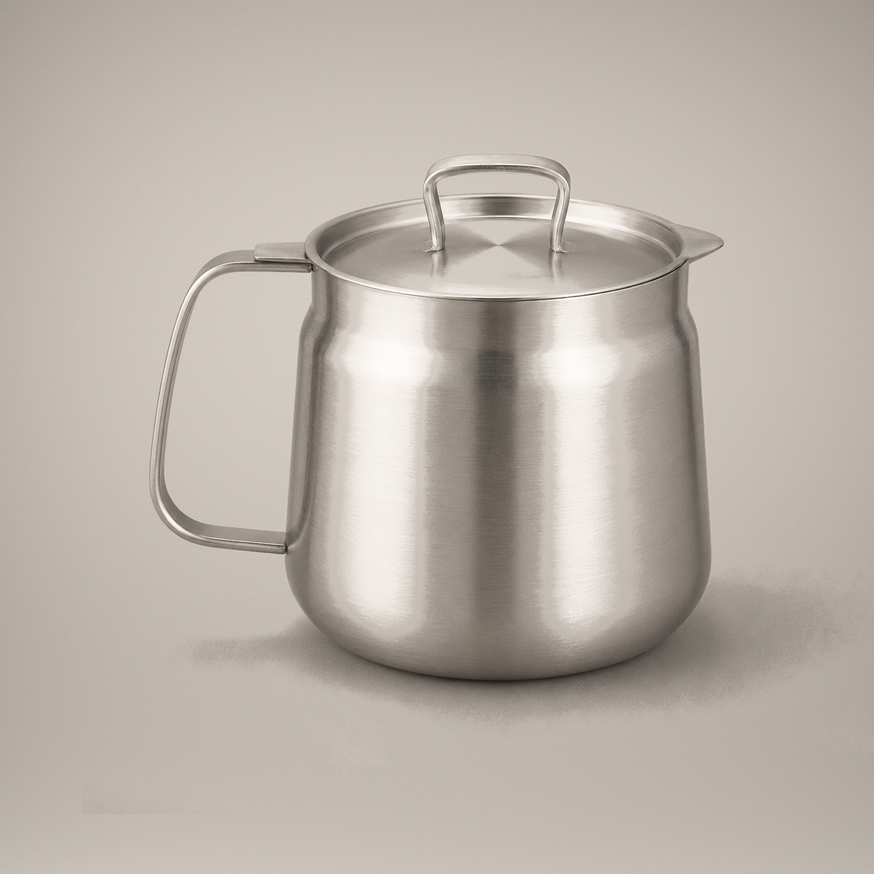 Studio front view of the stainless steel oil strainer pot with its lid on