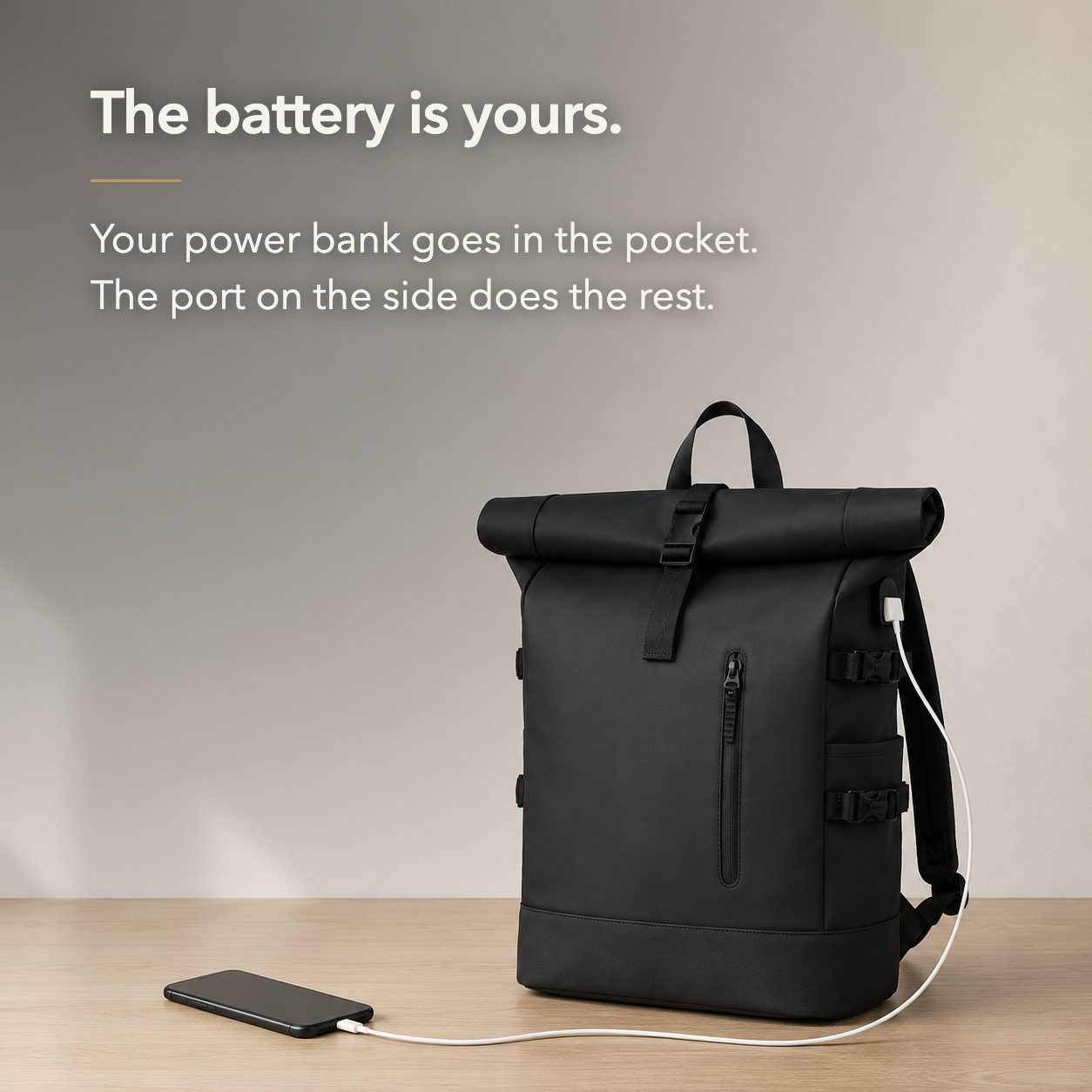 Claim card: the battery is yours. Your own power bank goes in the pocket and feeds the port on the side
