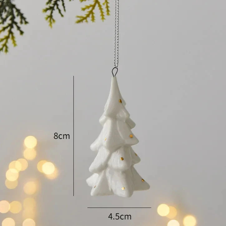 Spruce ornament hanging from its cord, marked 8 centimeters tall and 4.5 centimeters wide