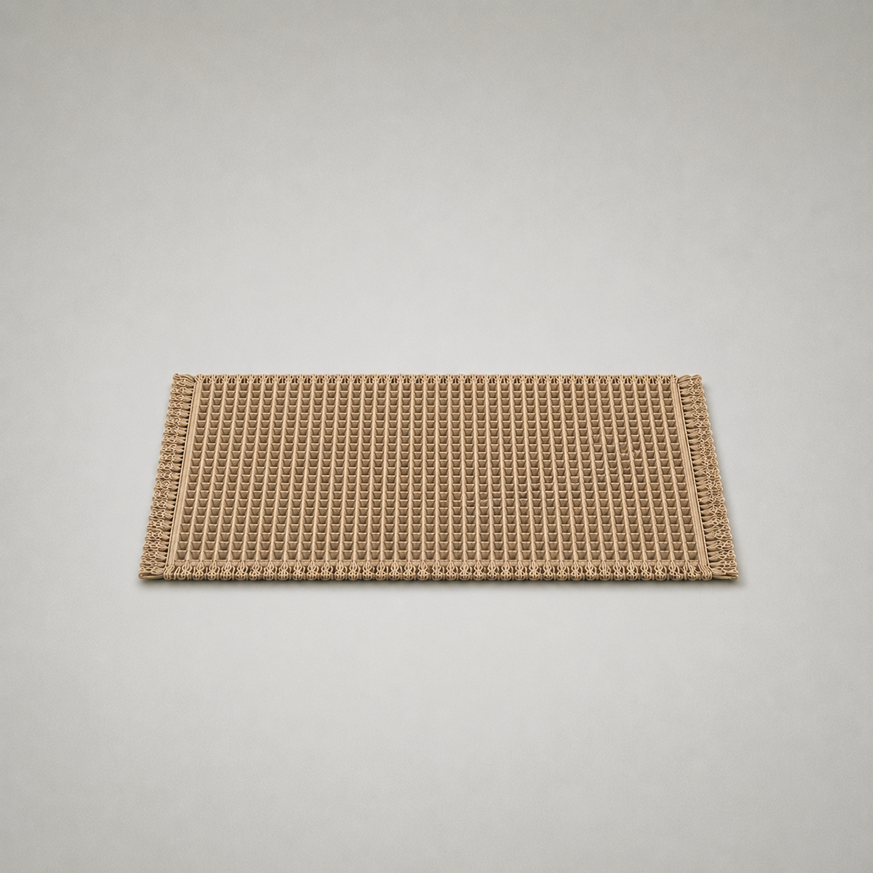 Khaki waffle weave bath mat laid flat on a plain grey background, seen from the front