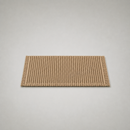 Khaki waffle weave bath mat laid flat on a plain grey background, seen from the front