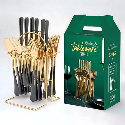 Cutlery set with black handles and gold heads hanging on a gold arched storage rack