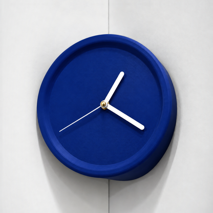 Blue corner wall clock in an inside wall corner, white hands