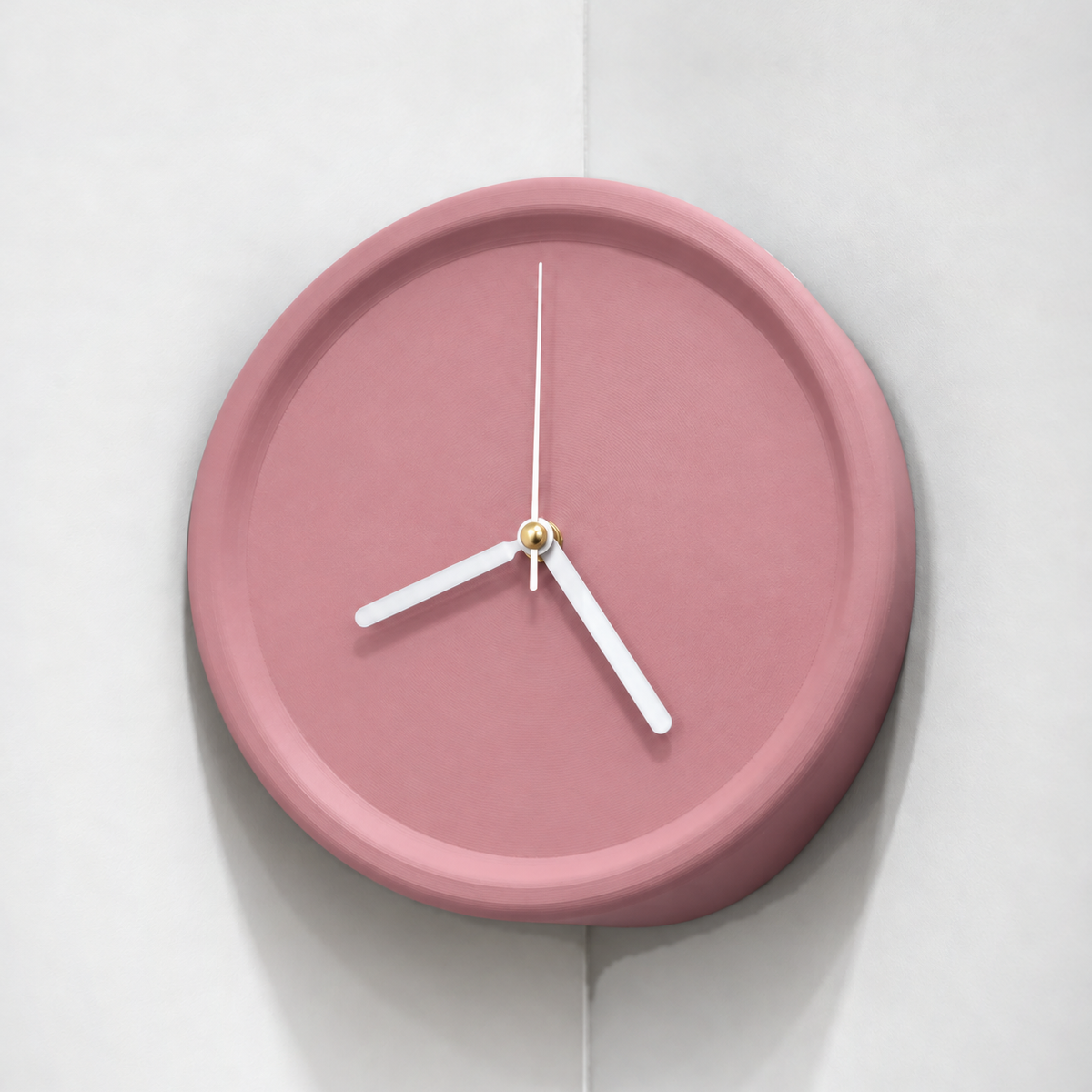 Pink corner wall clock in an inside wall corner, white hands