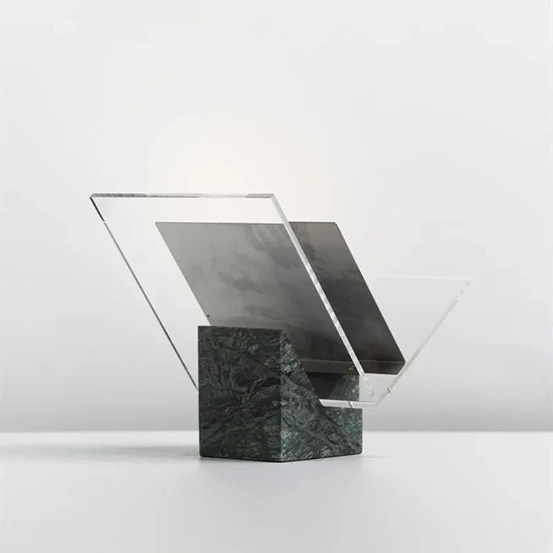 Green marble magazine holder, empty, showing the notch in the block that holds the clear acrylic V