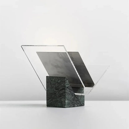 Green marble magazine holder, empty, showing the notch in the block that holds the clear acrylic V