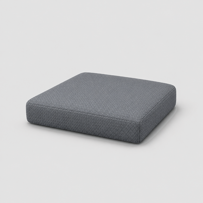 Seat cushion fitted with a charcoal stretch cover with a fine raised cross-hatch texture, on a light gray background