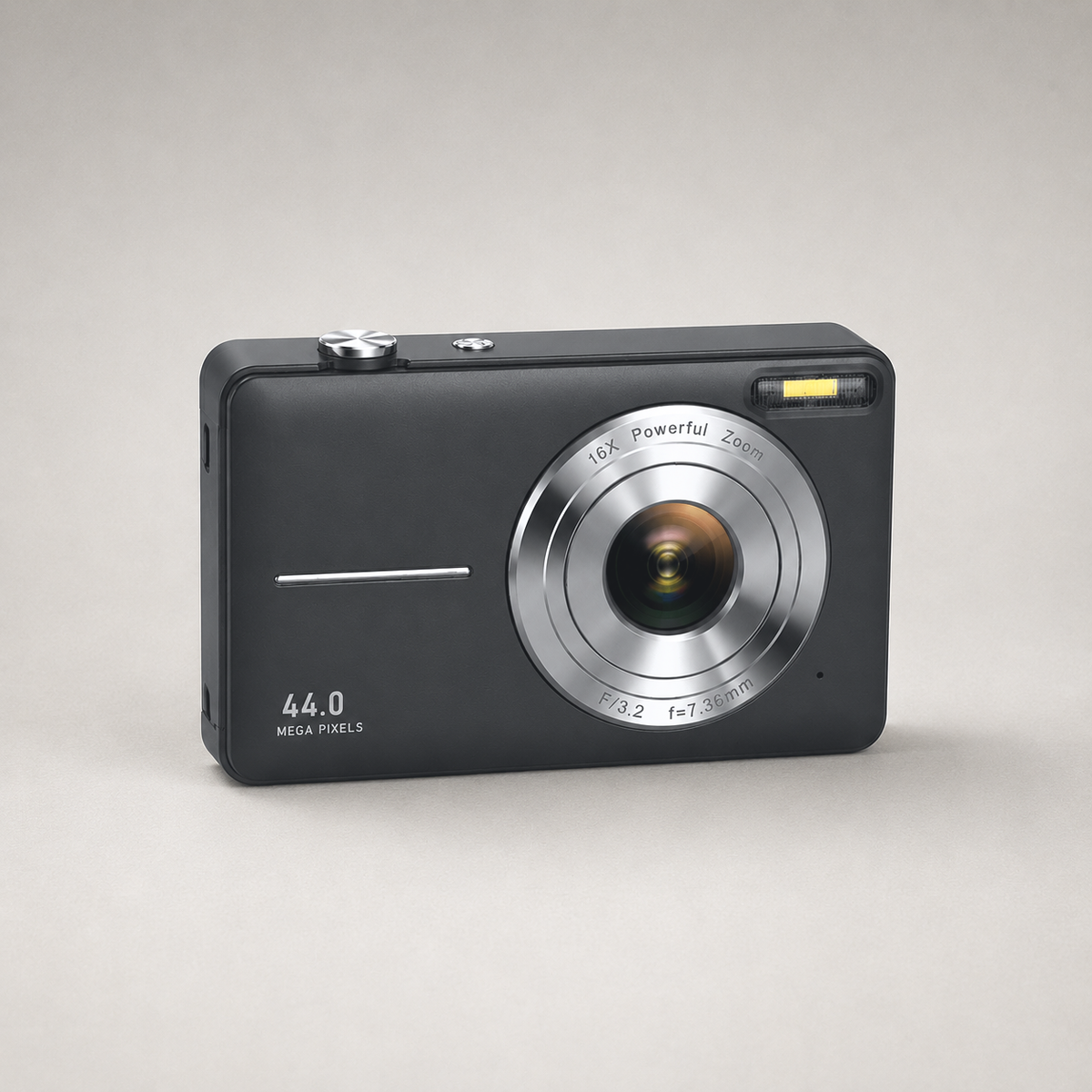 Black compact digital camera on a plain grey studio background, front three-quarter view showing the silver lens ring, the shutter button on the top plate and the flash window at the top right