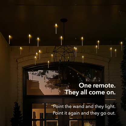 One remote and they all come on, floating LED candles under a porch roof at night