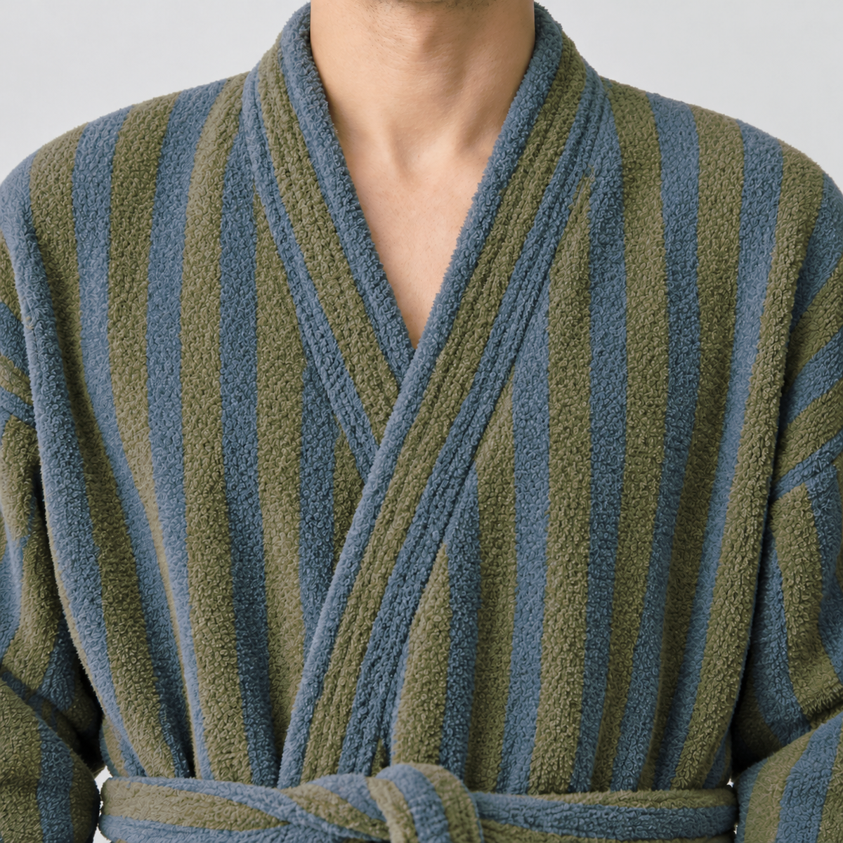 Close-up of the olive and blue bathrobe's kimono collar band, striped along its length, crossing over the vertical stripes