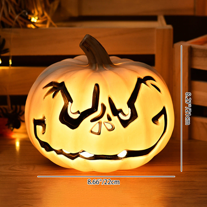 White Scowl carved pumpkin lamp dimensions: 8.66 in (22 cm) wide and 8.27 in (21 cm) tall