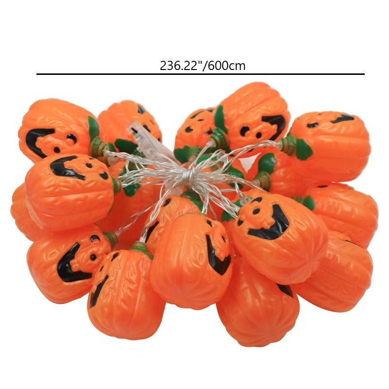 Bundled jack-o'-lantern string light on white with a length line marked 236.22 inches, 600 cm