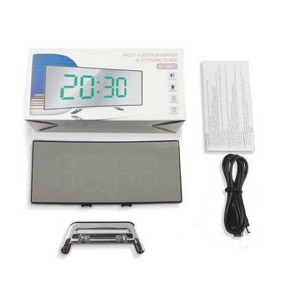 The clock, its stand and USB cable with the retail box