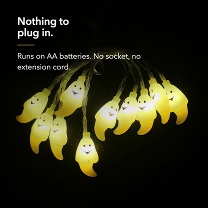 Nothing to plug in - a warm white ghost string light running on AA batteries, no socket or extension cord