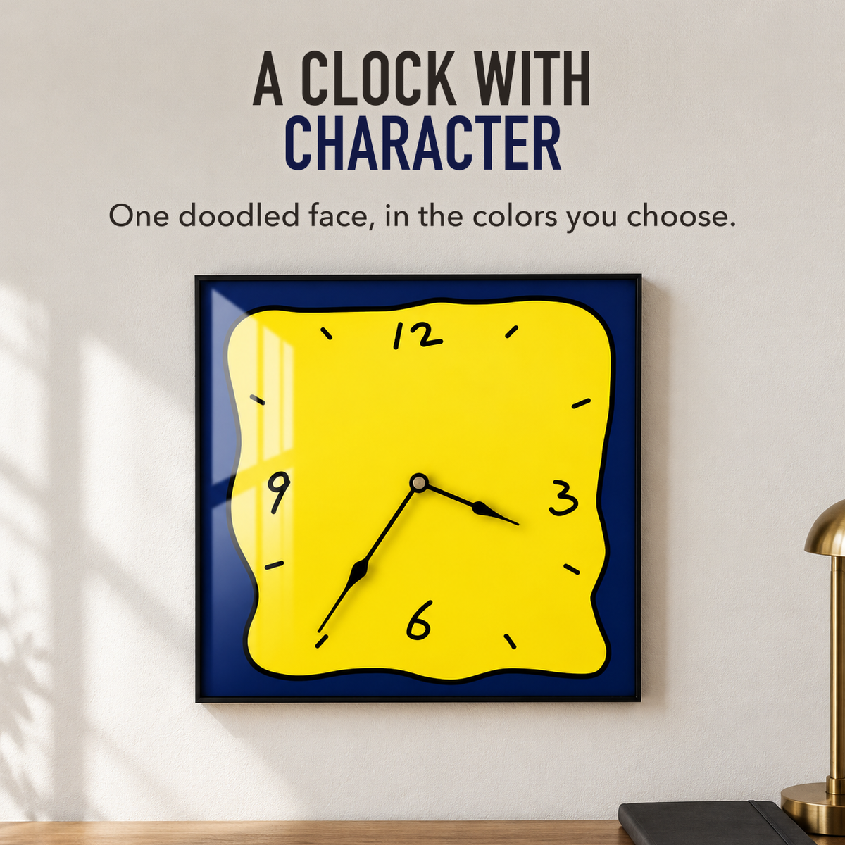 Text image: A clock with character. A square wall clock with a yellow face and navy border above a desk