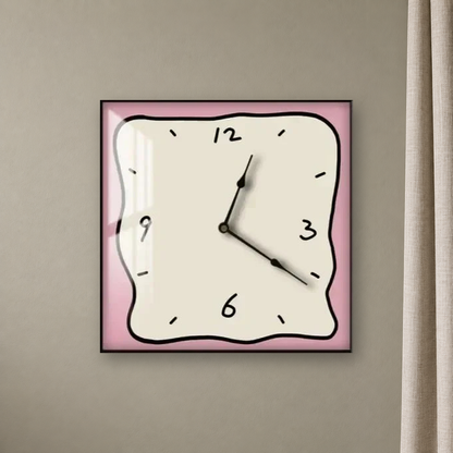 Square wall clock with a wavy doodle-style outline, a beige face and a pink border, hanging centred on a greige wall beside a linen curtain