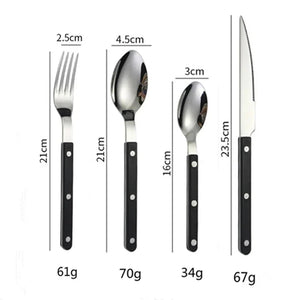 Black handled four piece set, fork, knife, spoon and teaspoon, laid out on white with printed lengths and weights