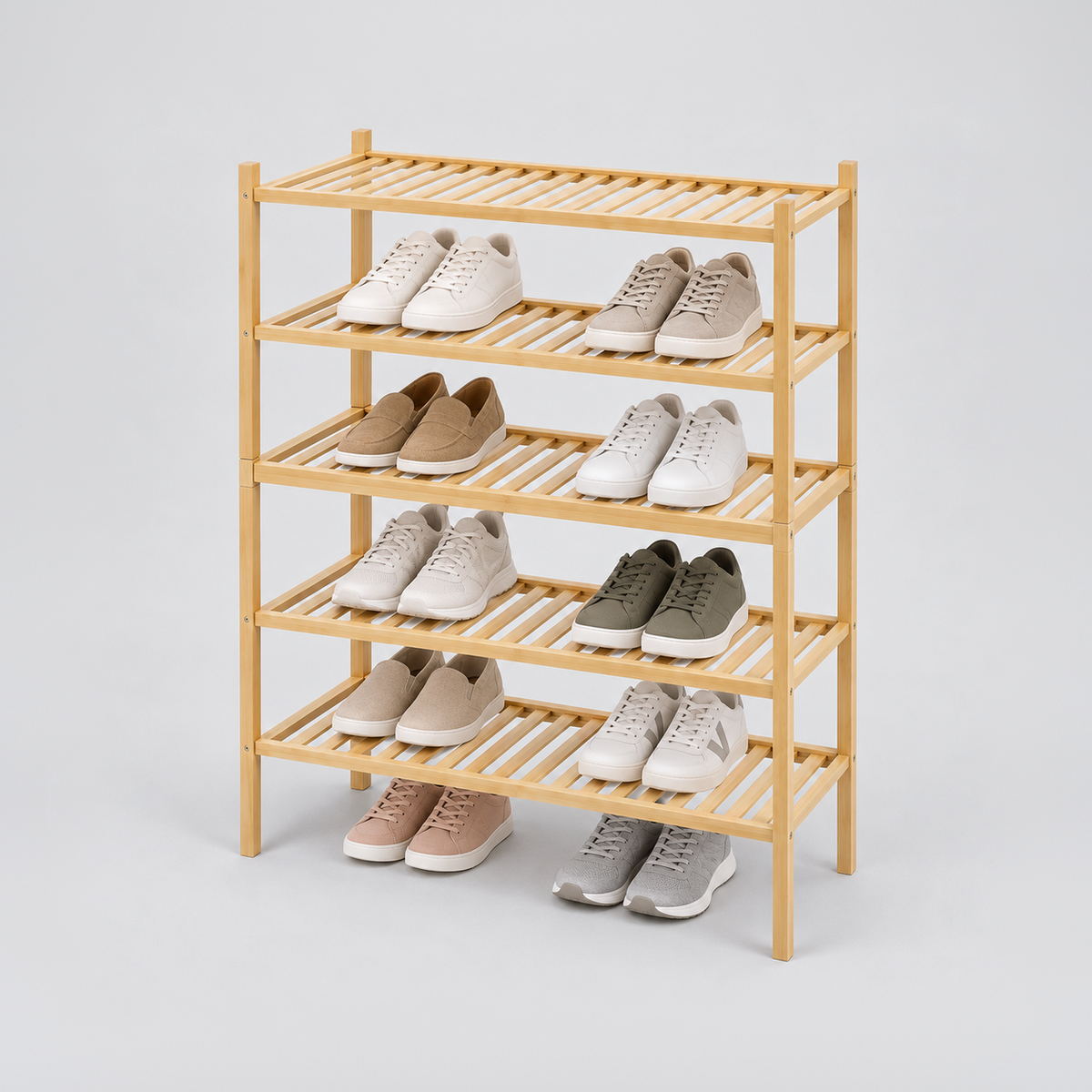 A 2 tier bamboo shoe rack stacked on a 3 tier rack to make five shelves, holding shoes, on a light grey background