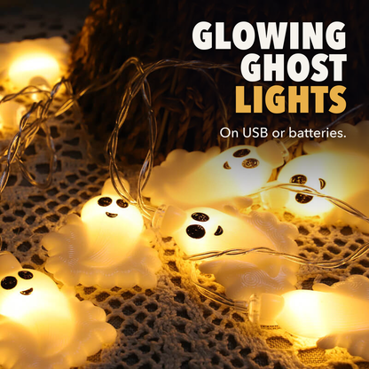 Glowing ghost lights on USB or batteries, a string of warm white ghosts on a tablecloth
