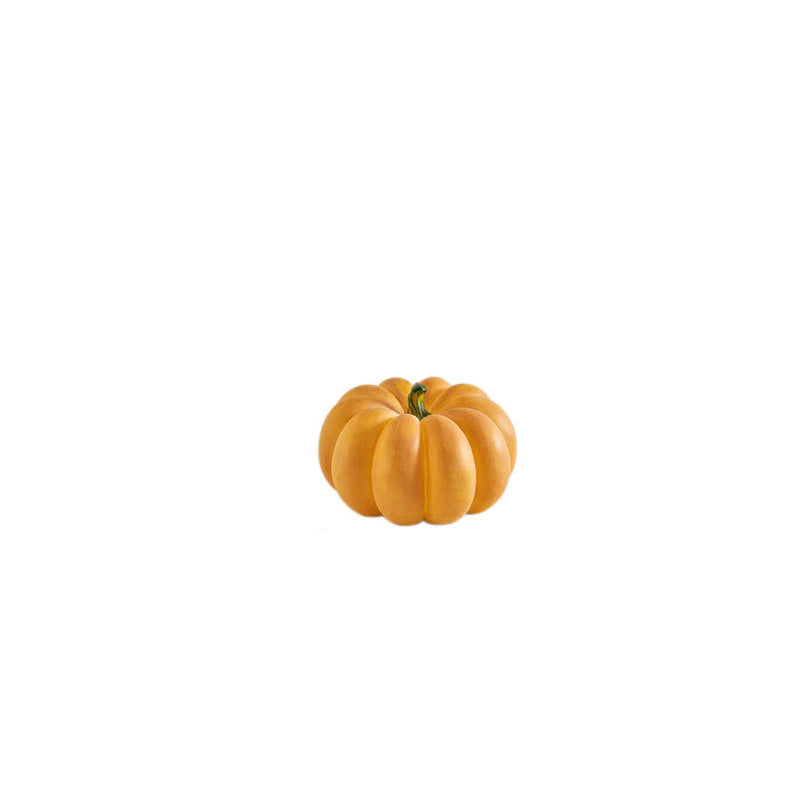 Resin pumpkin lamp switched off, shown small on a white background