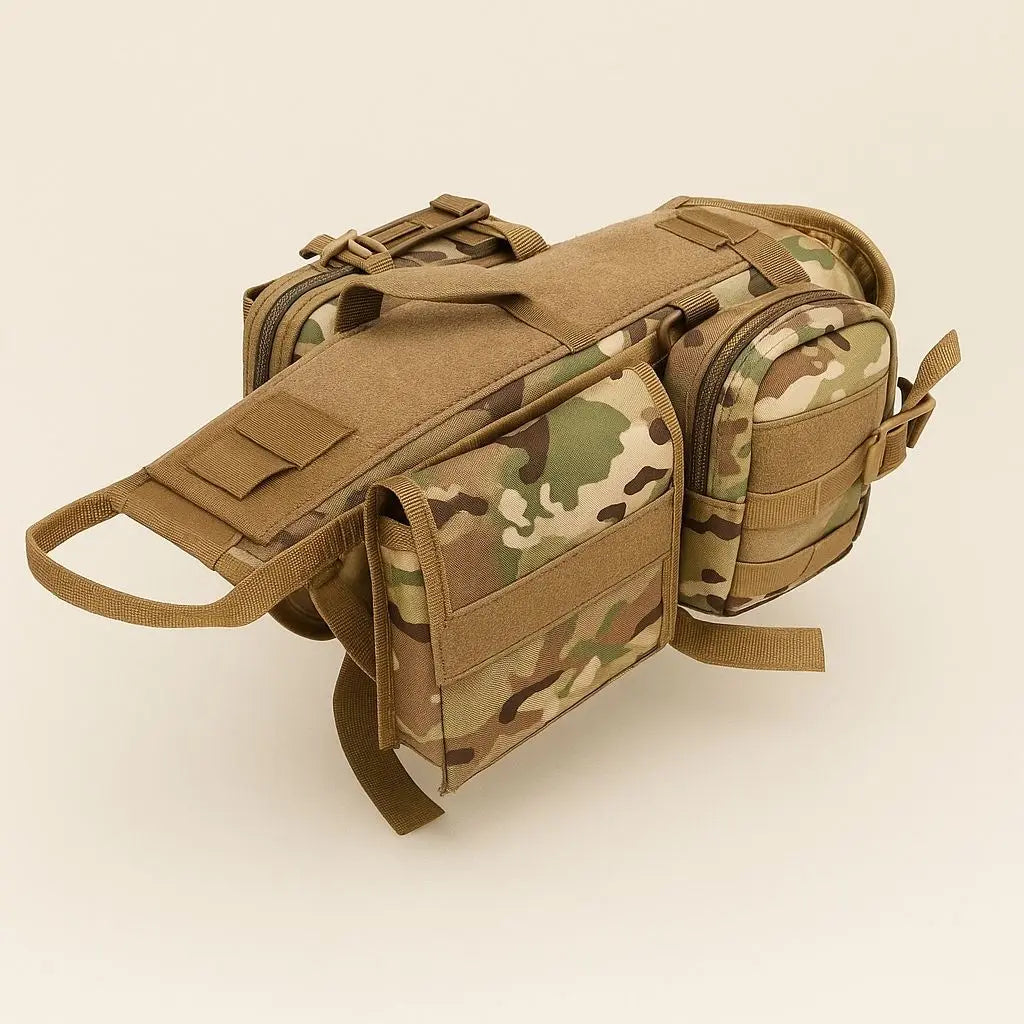 Camouflage dog harness vest seen from above, showing the blank patch panel and the handle along the back